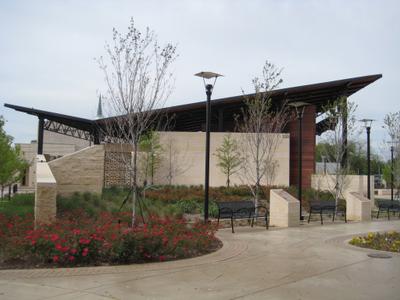 Arlington Founders Plaza exterior featuring running bond brick facade with decorative soldier course accents