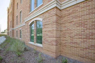 Multi-story elevation showing running bond pattern continuity